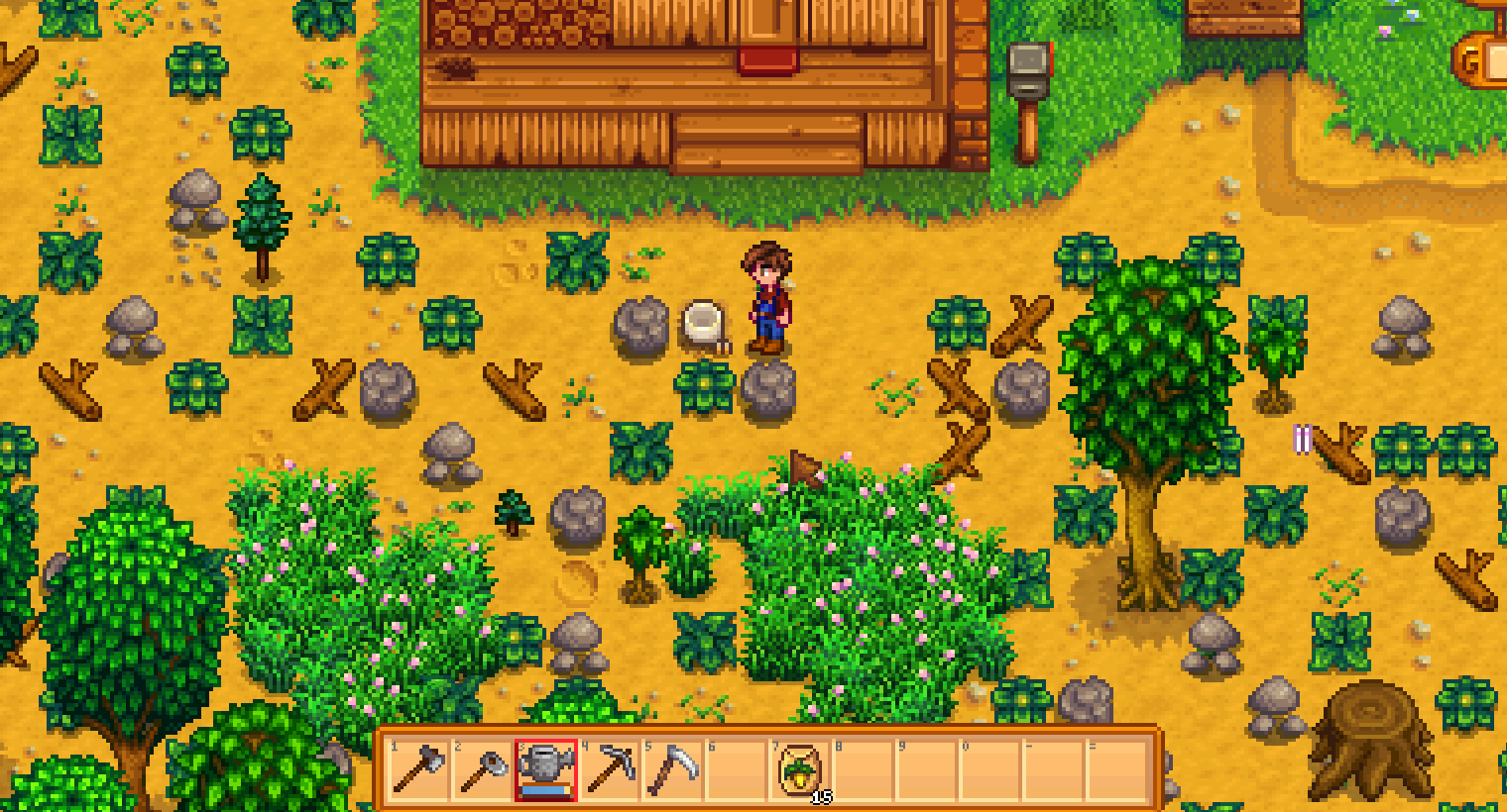 Stardew Valley Day 1 farm porch with rocks weeds and logs; hotbar shows axe hoe watering can pickaxe scythe and 15 Parsnip seeds